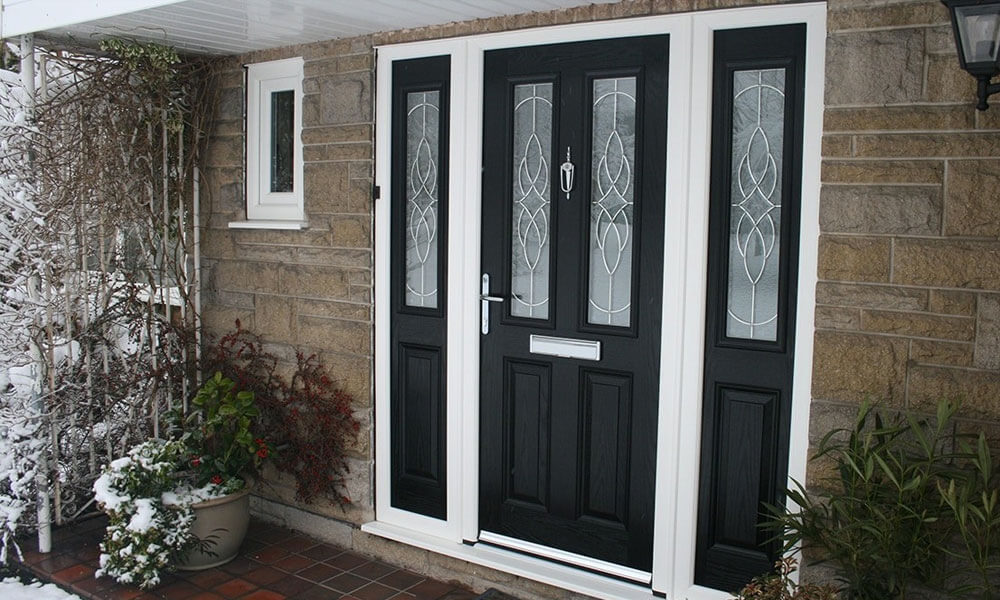 Black composite doors with white frames