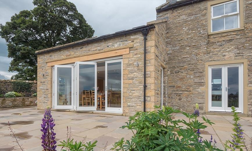 Bottom hung bi-folds open the door to imperfect openings