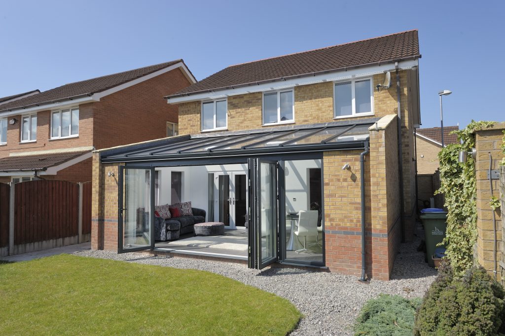 grey lean to conservatory with bifold door