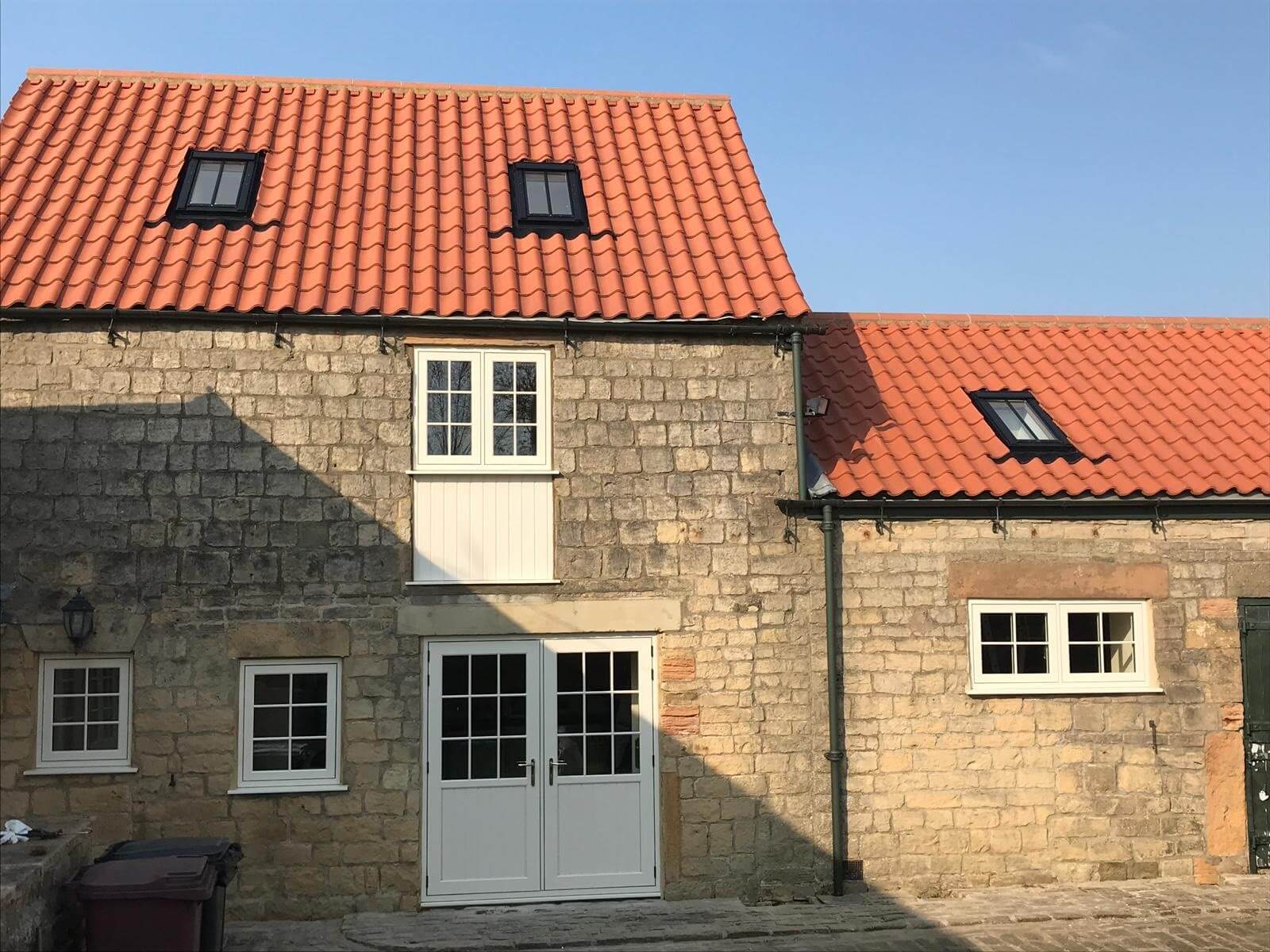 cream flush sash windows and french doors