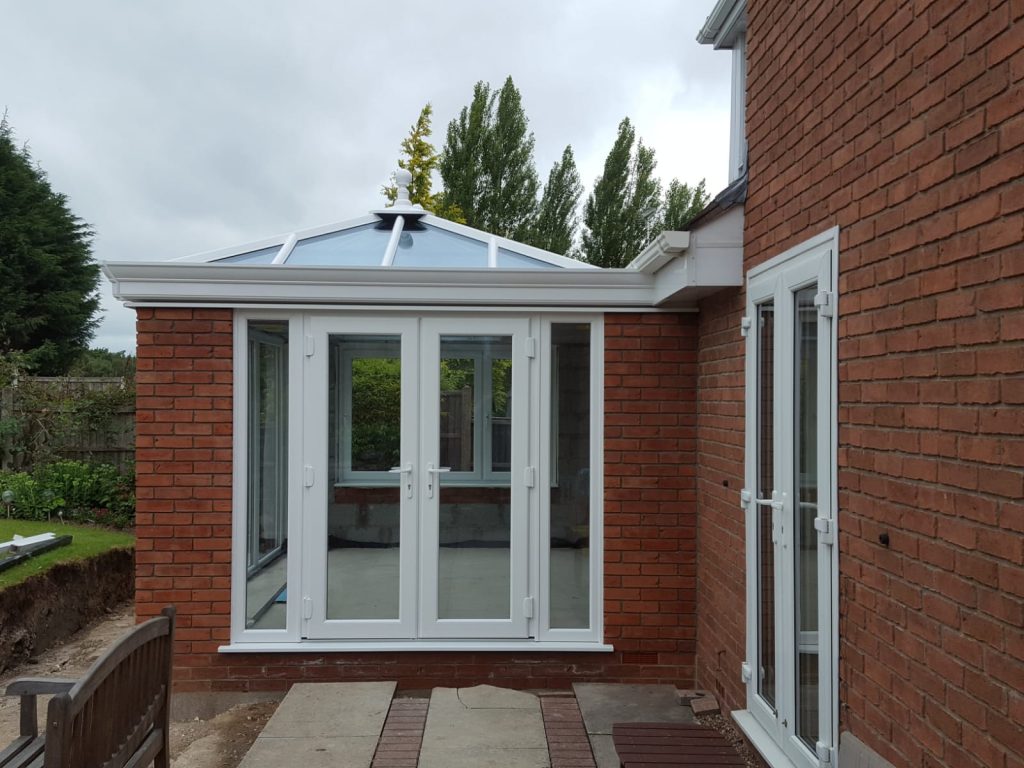 A White Ultraframe Orangery with French doors