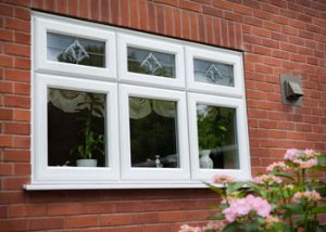 White casement with leaded glass and trickle vents