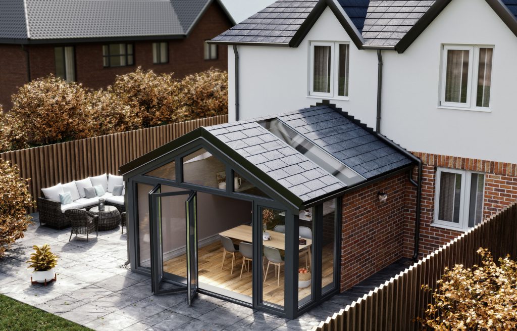 Icotherm Conservatory black roof on the back of a white house